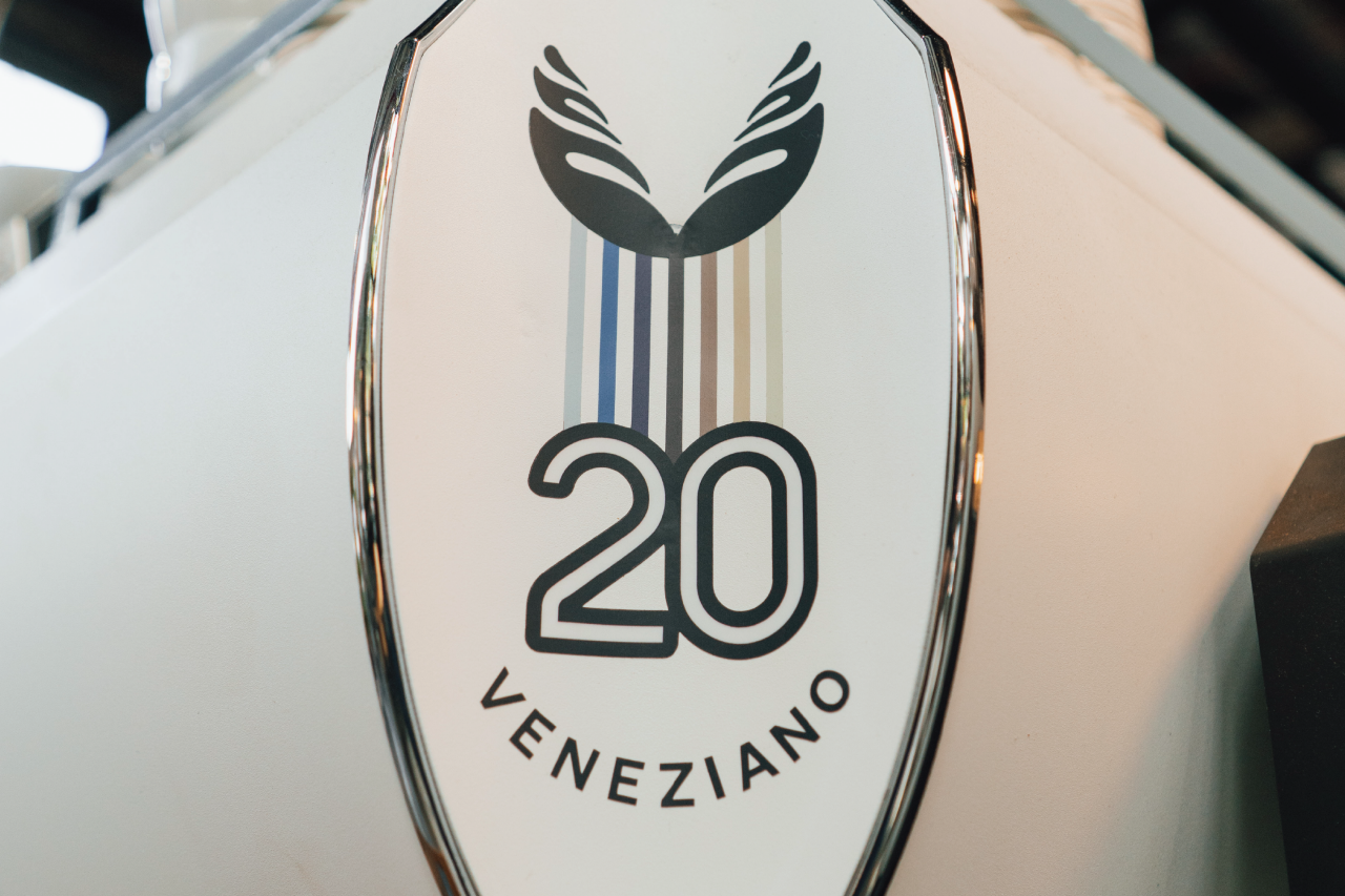 Veneziano 20th anniversary logo on their espresso machine.