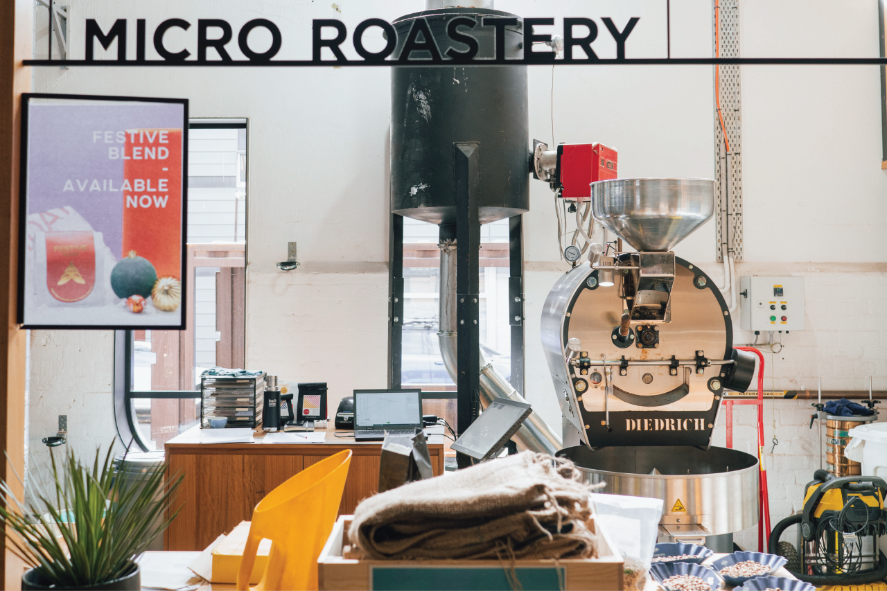 Veneziano micro roastery window looking into the internal operations.