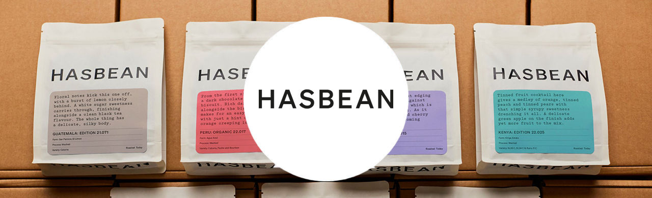 Hasbean logo and a PROBAT coffee roaster machine.