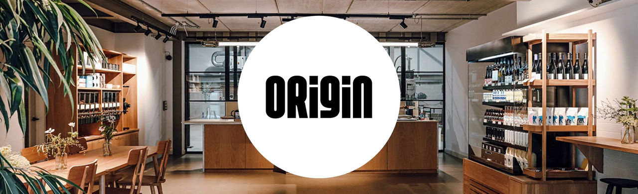 Origin logo and a panorama picture of an Origin roastery.